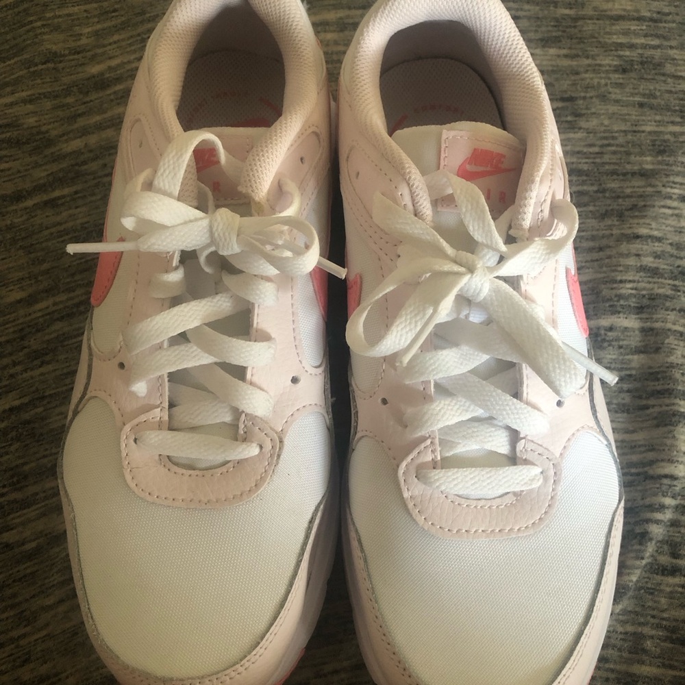 Pink and white Nike air